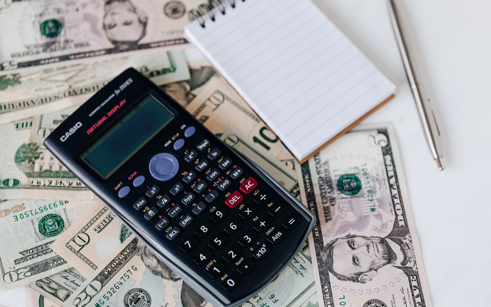 Bank paperwork and a passport, the documentation a foreign owner needs to repatriate the proceeds of a Lao property sale